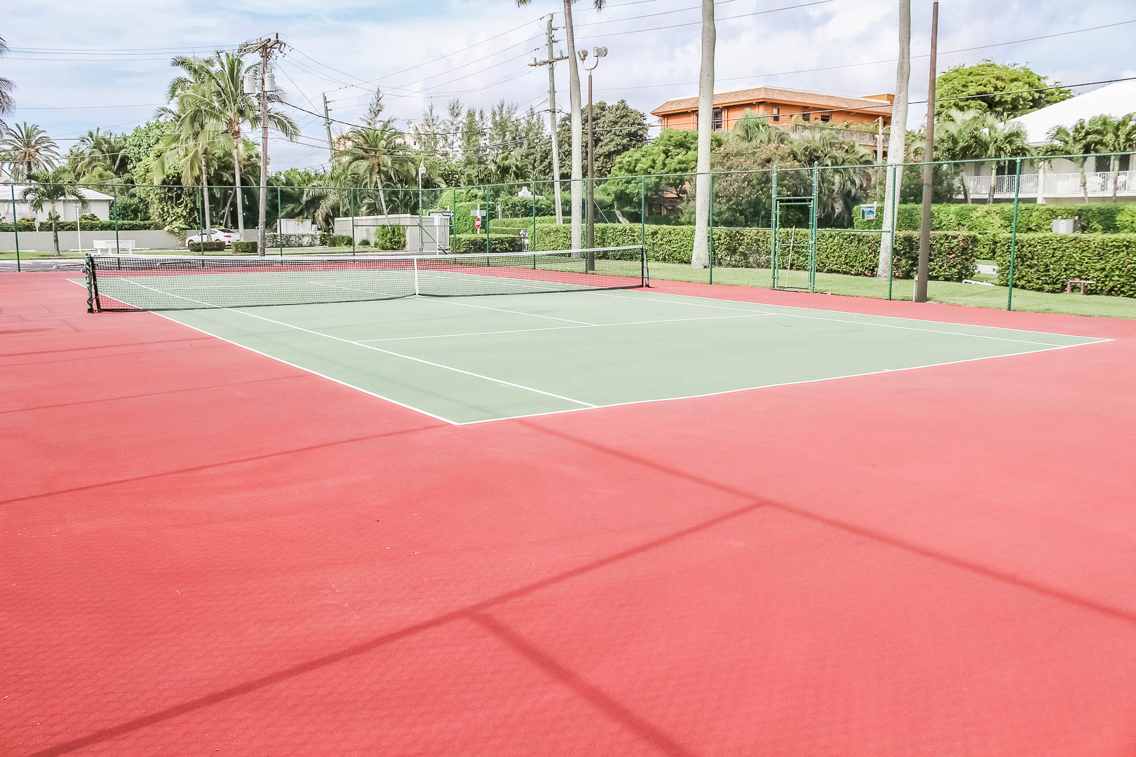 An expansive tennis court at VRI's Berkshire by the Sea in Florida.